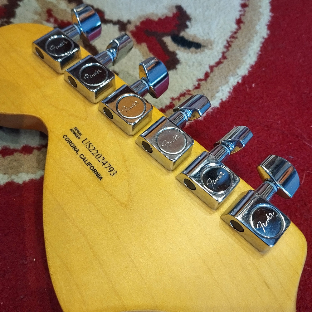 Back view of the headstock of a Fender American Pro II Telecaster Deluxe electric guitar, showing the tuning pegs and serial number.