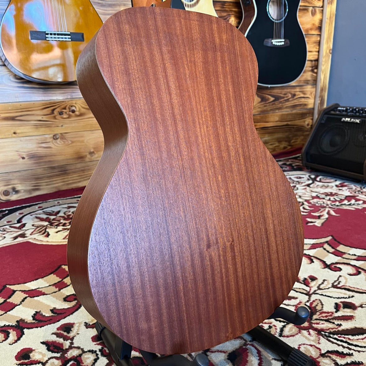 Back body of a Taylor Academy 12e Nylon acoustic guitar,