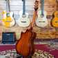 Back body of an acoustic guitar placed on a guitar stand