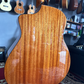 Back body of an acoustic guitar with natural wood color
