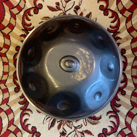 Beginner handpan made in bali. Gray metallic color.