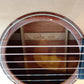 Acoustic guitar with a natural wood finish 