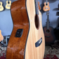Acoustic guitar with a natural wood finish